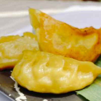 Gyoza de pato laqueado con brote de bambú